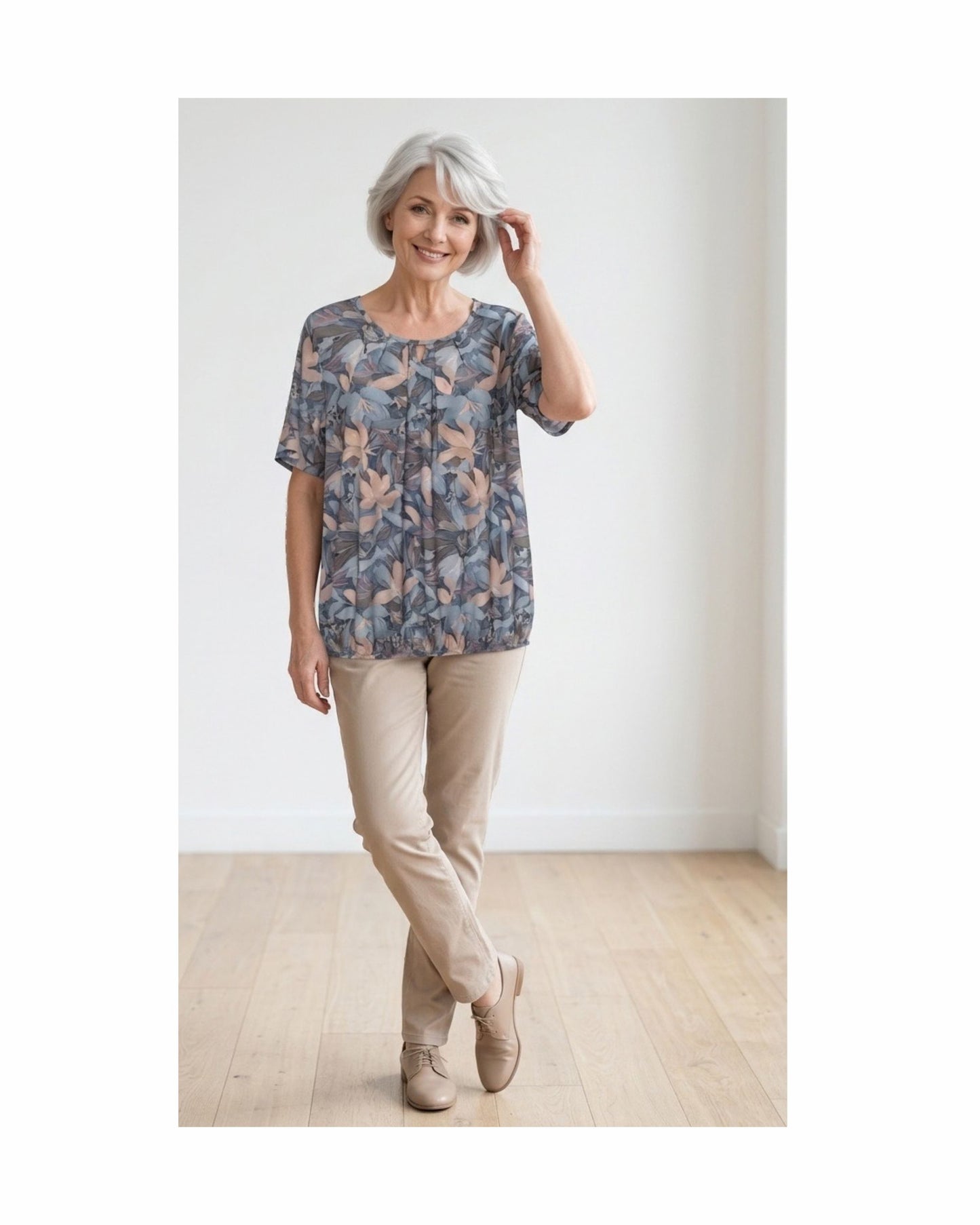 Marijke Mode t-shirt met ronde hals en O-detail driekwart mouw zachte kleuren