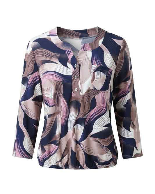 Blousonshirt met lange mouwen, knopen en borstzak, verkrijgbaar bij Marijke Mode.