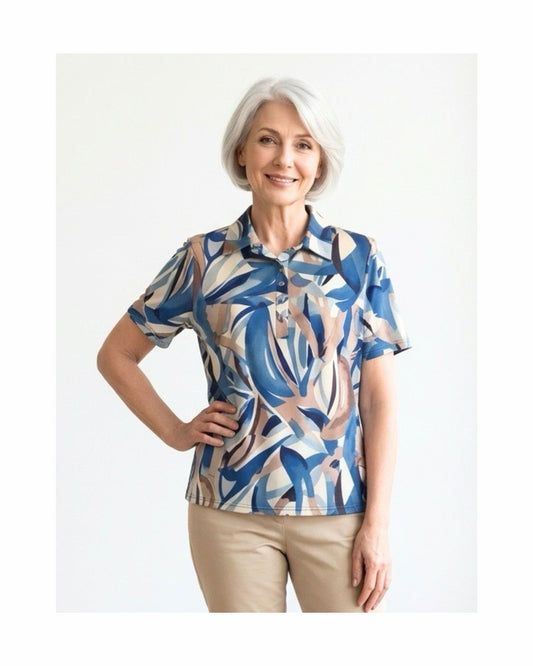 Polo met kraag en zilveren knopen in voorjaarskleuren – verkocht door Marijke Mode