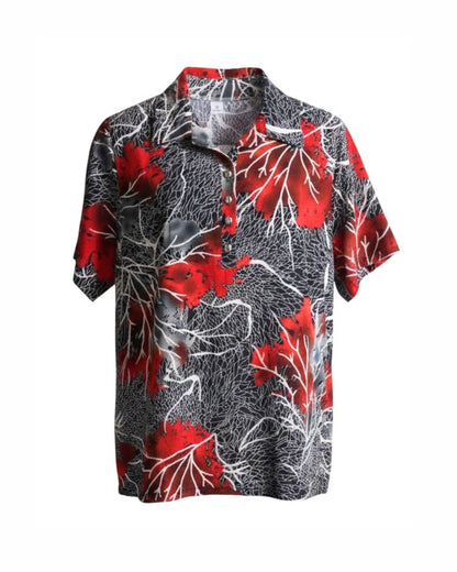 Polo met kraag en zilveren knopen in voorjaarskleuren – verkocht door Marijke Mode