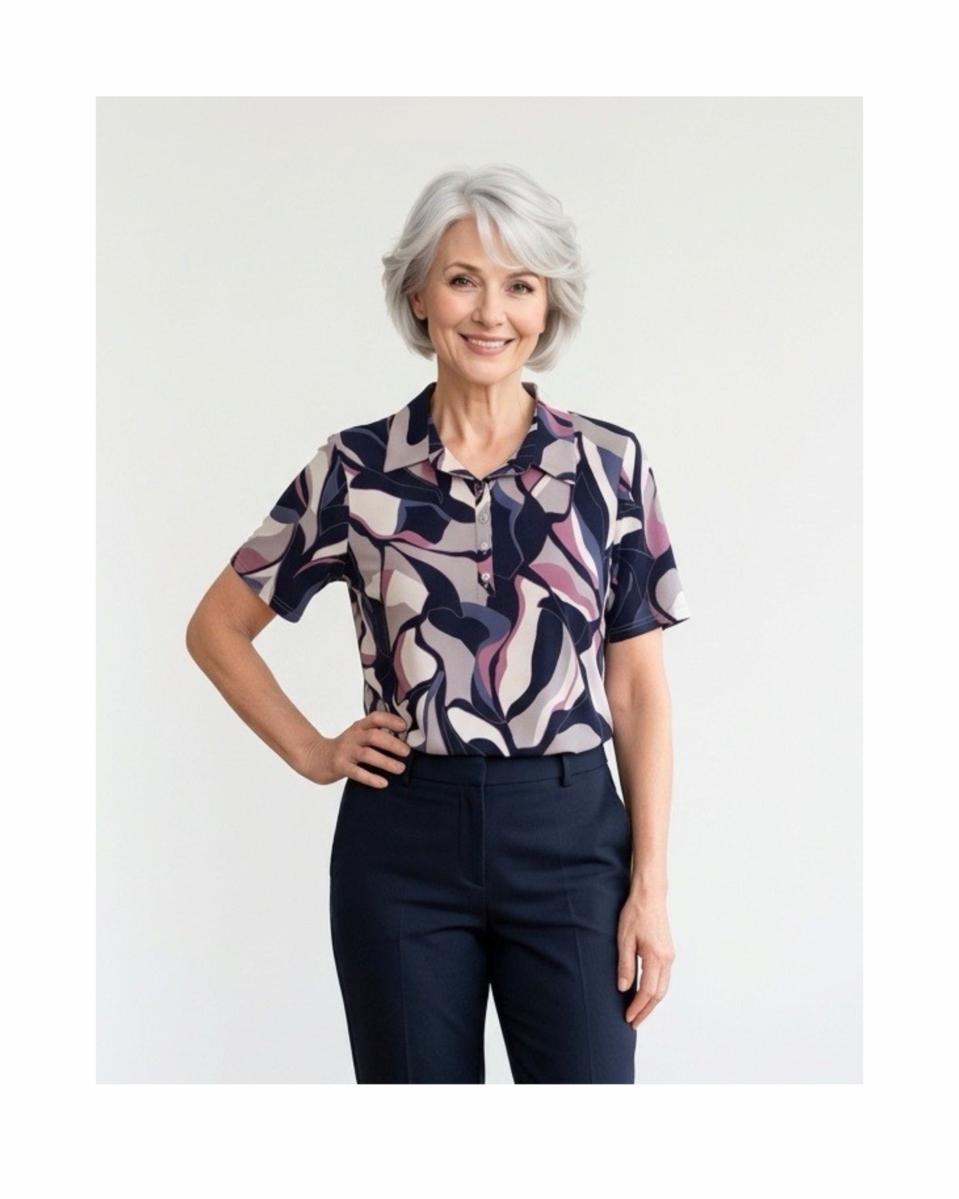 Polo met kraag en zilveren knopen in voorjaarskleuren – verkocht door Marijke Mode