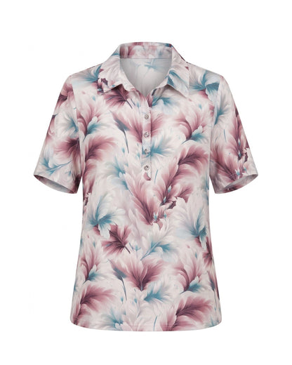Dames poloshirt van viscose met kraag, knoopsluiting en splitjes, verkrijgbaar bij Marijke Mode.
