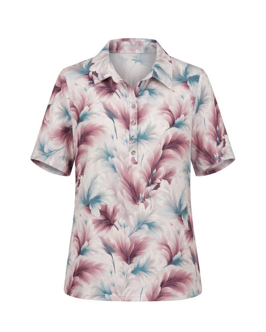 Dames poloshirt van viscose met kraag, knoopsluiting en splitjes, verkrijgbaar bij Marijke Mode.