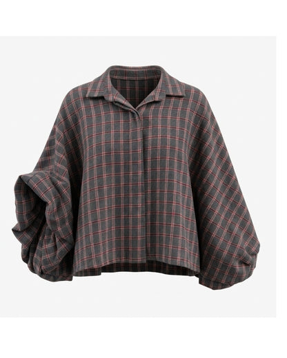 Warme blouse met vlindermouwen, verkrijgbaar bij Marijke Mode.