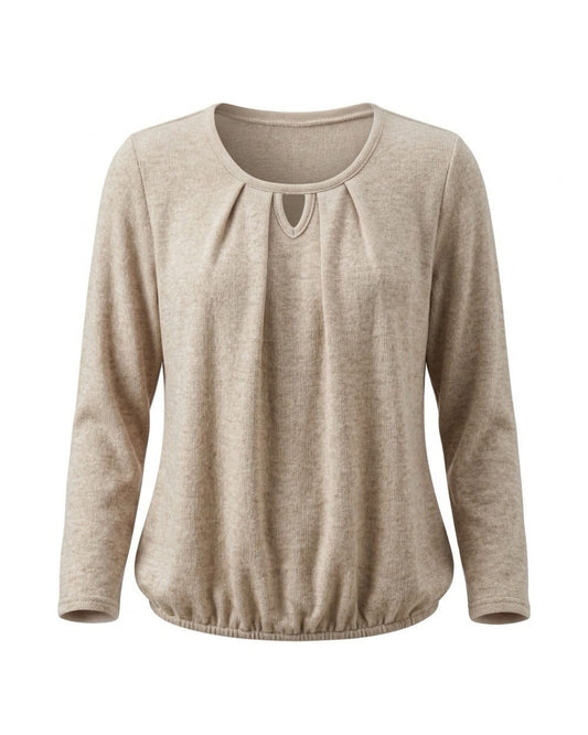 Blousonshirt in warme kwaliteit met lange mouwen, ronde hals met O-detail en elastiek aan de onderkant, verkrijgbaar bij Marijke Mode.