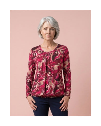 Blousonshirt in warme kwaliteit met lange mouwen, ronde hals met O-detail en elastiek aan de onderkant, verkrijgbaar bij Marijke Mode.