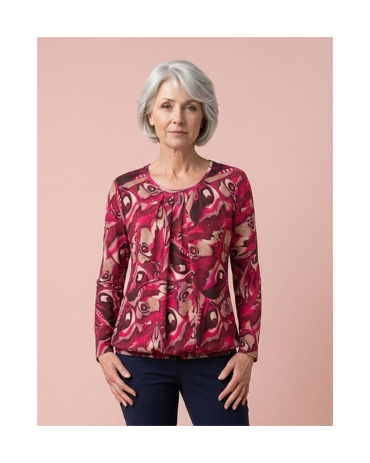 Blousonshirt in warme kwaliteit met lange mouwen, ronde hals met O-detail en elastiek aan de onderkant, verkrijgbaar bij Marijke Mode.