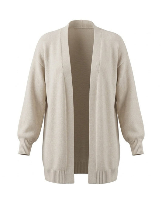 Losvallend warm vest met zakken en boorden, verkrijgbaar bij Marijke Mode.