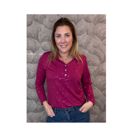 Feestelijk dames poloshirt met sparkling-details, lange mouwen en polokraag – verkrijgbaar bij Marijke 