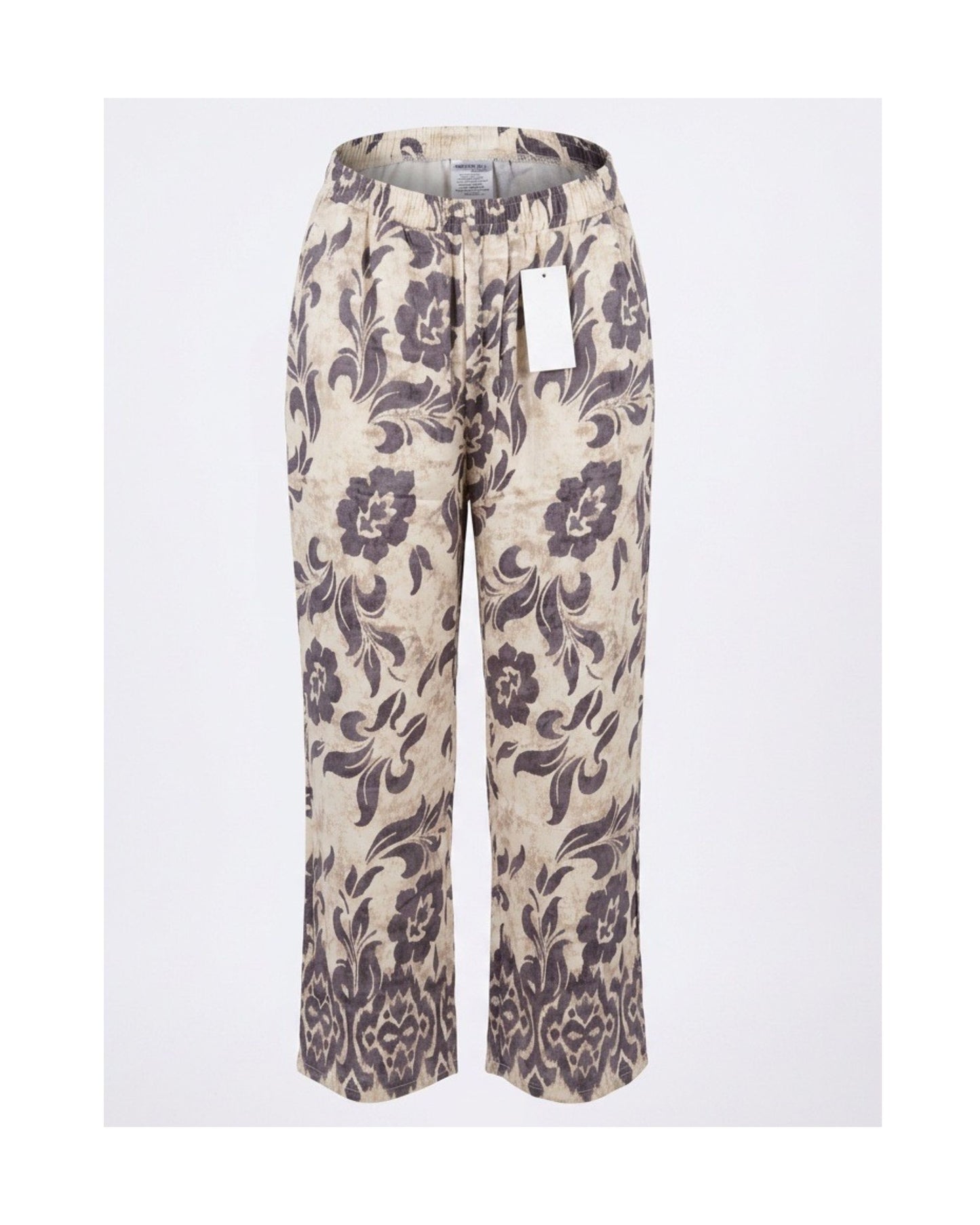 Luchtige bloemenprintbroek met elastische tailleband, sierkoord en steekzakken. Een comfortabele zomerbroek, verkrijgbaar in verschillende kleuren.
